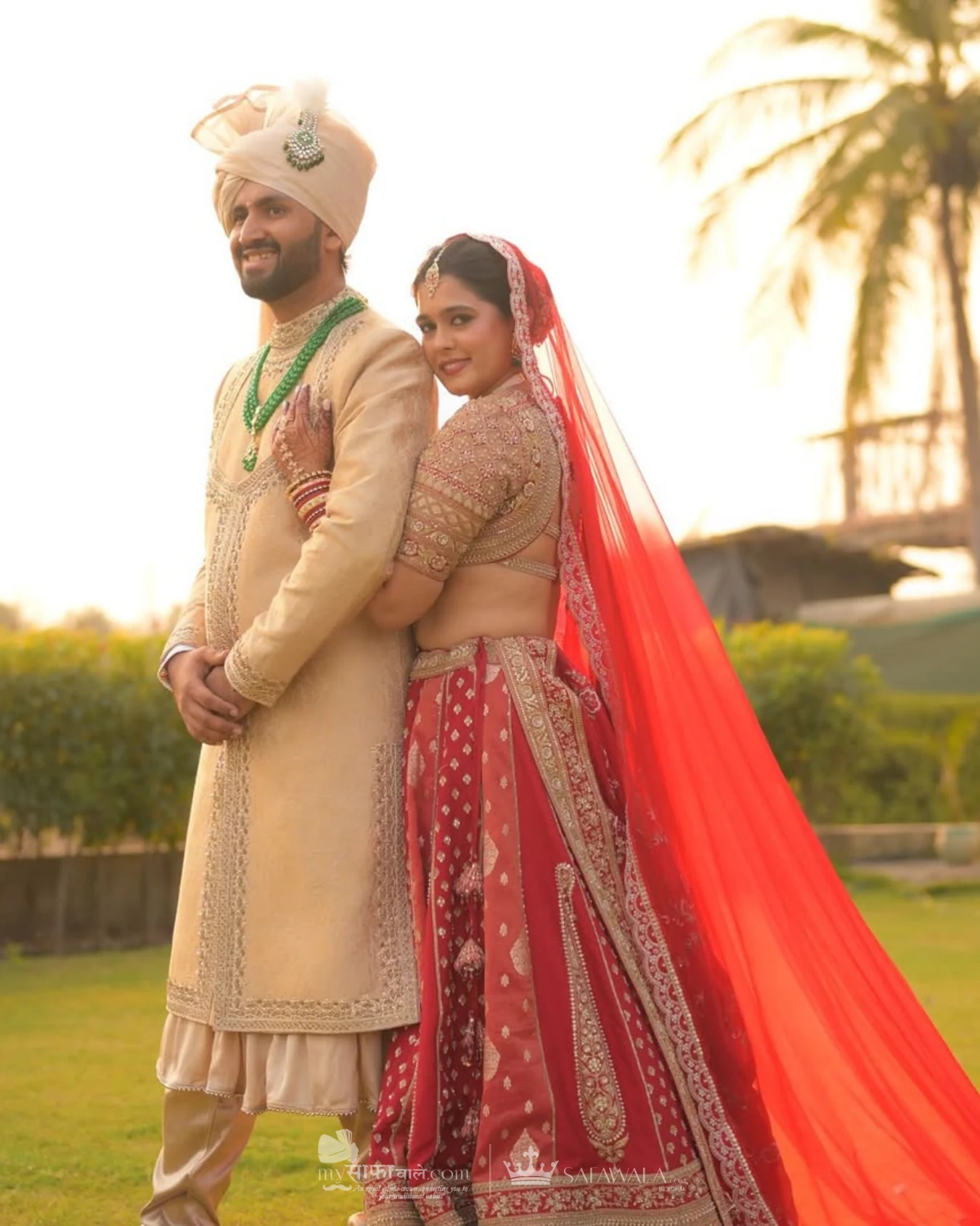 Classic groom pagdi styled with a red ceremonial stole for Baijnath